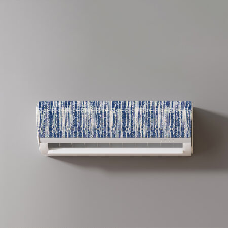 Oubliez les blocs techniques et ternes : transformez votre climatisation murale avec notre cache split déco au motif abstract jeans.